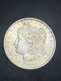 1881 Morgan silver dollar
