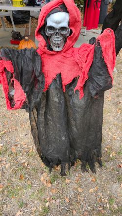 Hanging Skull with Red Hood