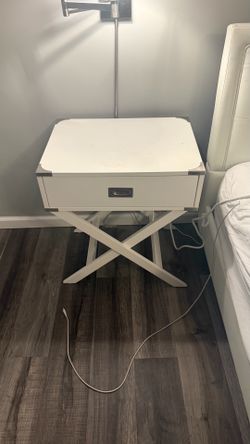 Two white bedside tables
