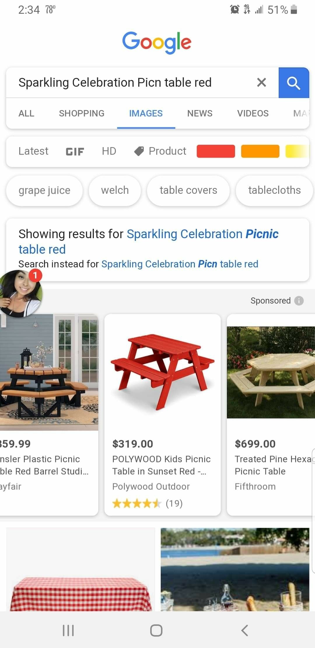 Red picnic table and tents