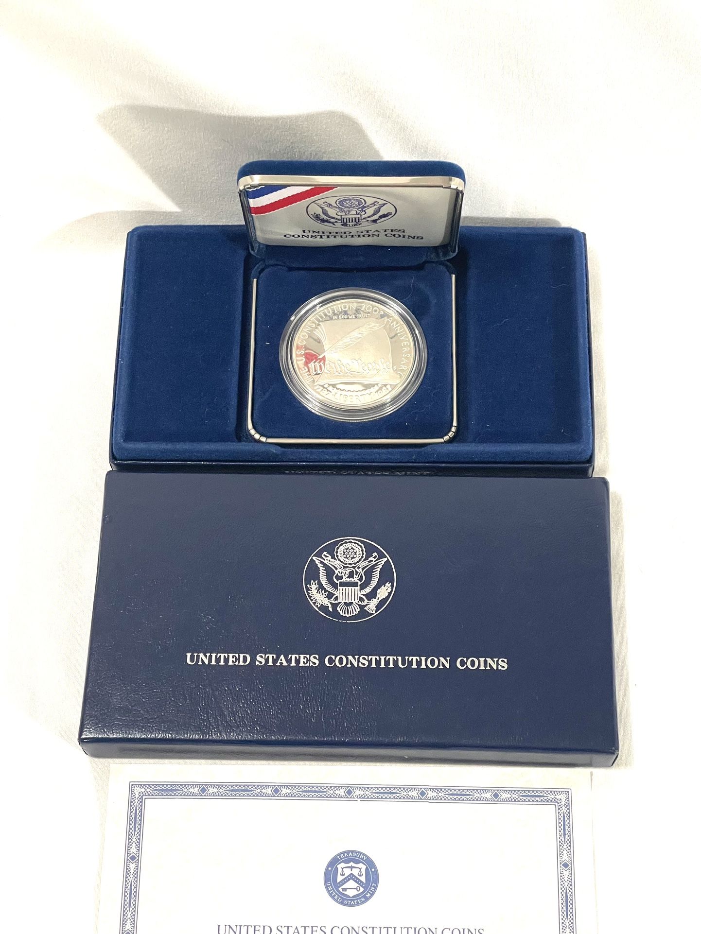 Mint Condition Sealed In Capsule With Case And Certificate 1987 Us Constitution (We The People) Silver Dollar Proof. Retail value $60.