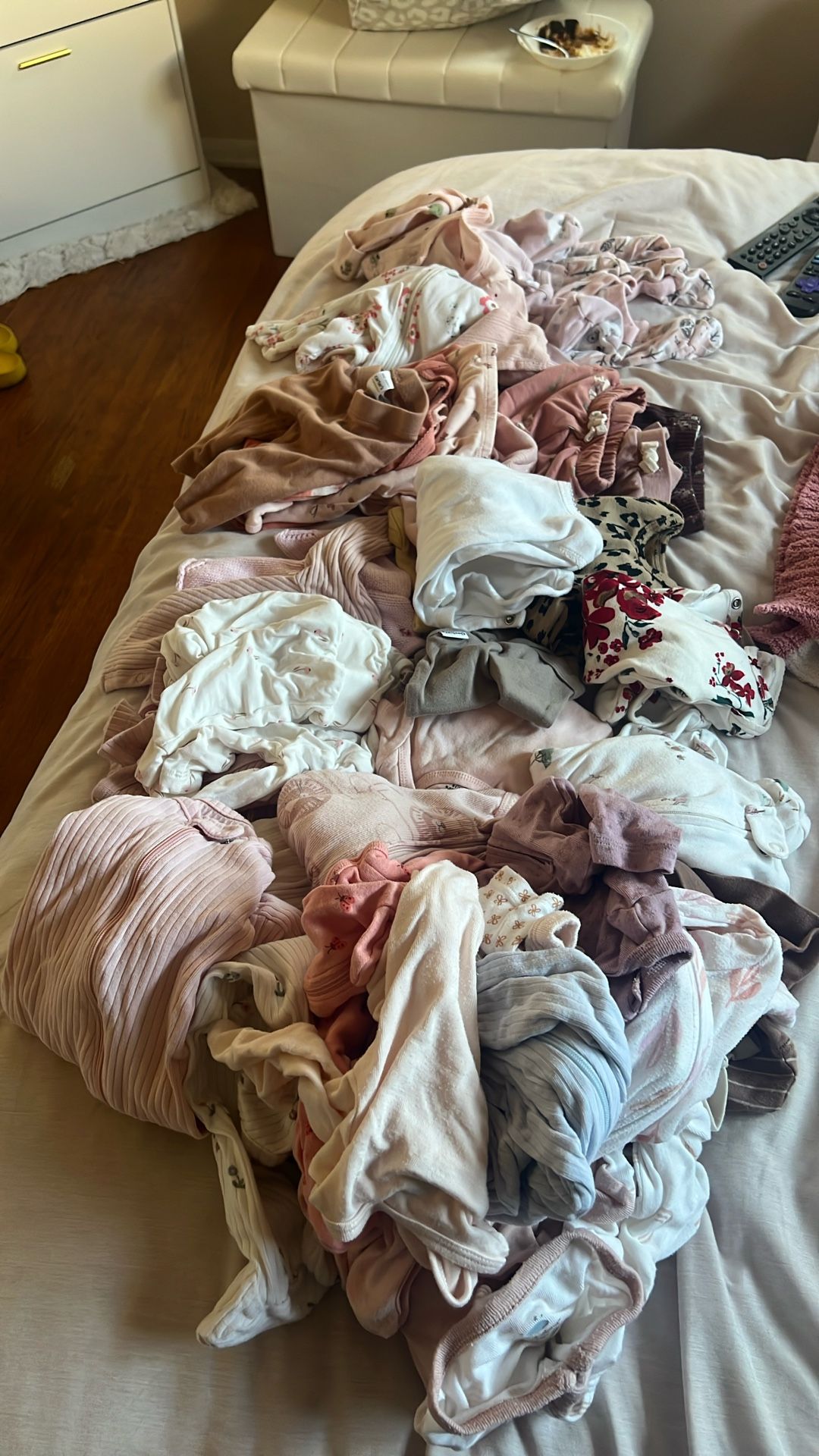 Lots of new born baby clothes