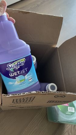 Swiffer WetJet Mop with 4 bottles of cleaning solution