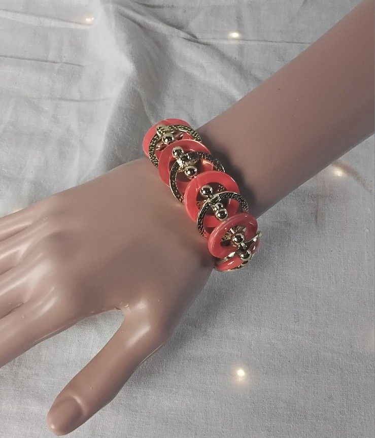 Woman's Gold Tone Metal and Orange Acrylic Stretch Bracelet