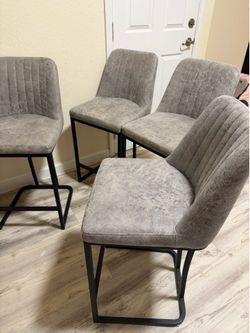 Grey faux leather tall dining chairs