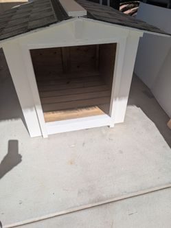 Custom-Made large dog house with shingle roof lifted from the ground guarantino leak. You can fit big dog there or two medium