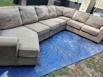 Big sectional cash only has small stain on back of couch from clorox spill
