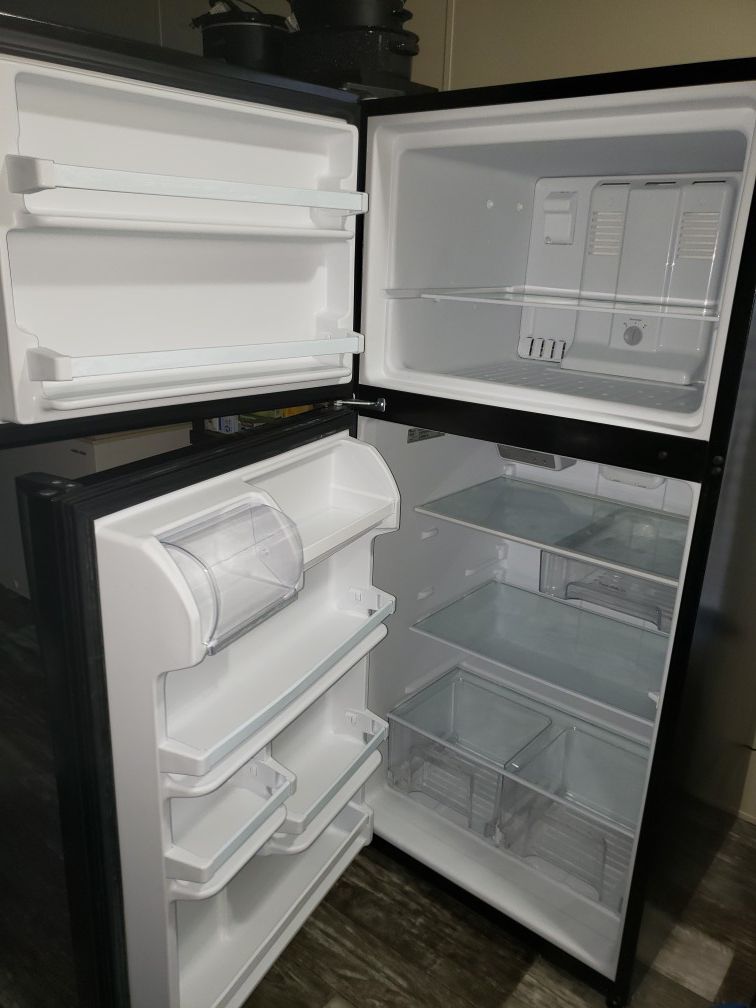 Whirlpool fridge freezer combo with option to put ice maker in. Bran new and never used came with our home and we already had a fridge
