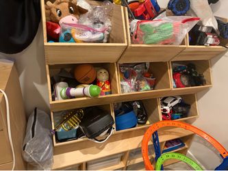 Toy Storage Organizer – Great Condition!  Large wooden toy storage organizer with multiple open cubbies and lower storage bins.