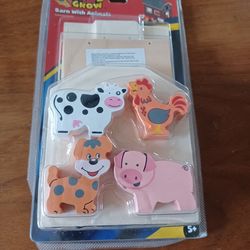 New unopened Build and Grow barn kit. Has four cute wooden animal figures: cow, rooster, dog, and pig. Great for little builders ages 5+. From Lowe's.