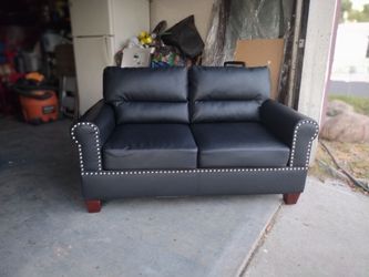 Two seater sofa/ couch love seat