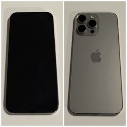 iPhone 15 Pro Max 256GB Natural Titanium in good condition for Spectrum Mobile.