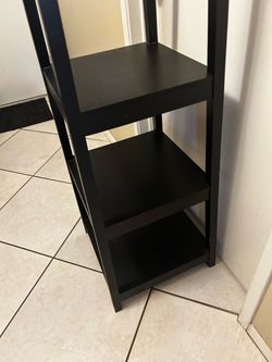 Coat hanger with shelves
