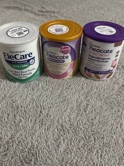 Formula Milk Cans. Neocate, EleCare, and Enfamil.