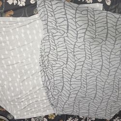 Multi-use capsule and breastfeeding cover.