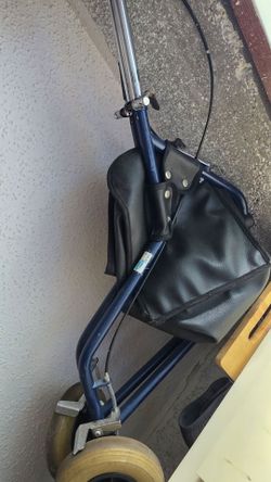 Walker with hand brake and storgae bag
