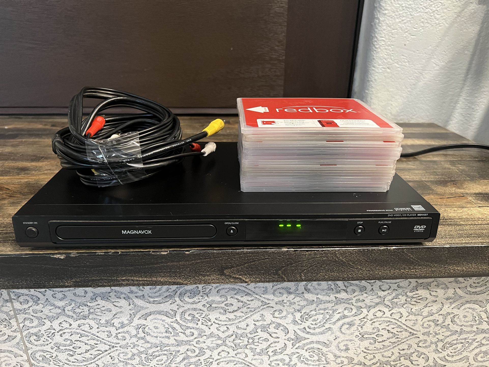 Magnavox CD/DVD Player + RCA Cable + 11 DVDs