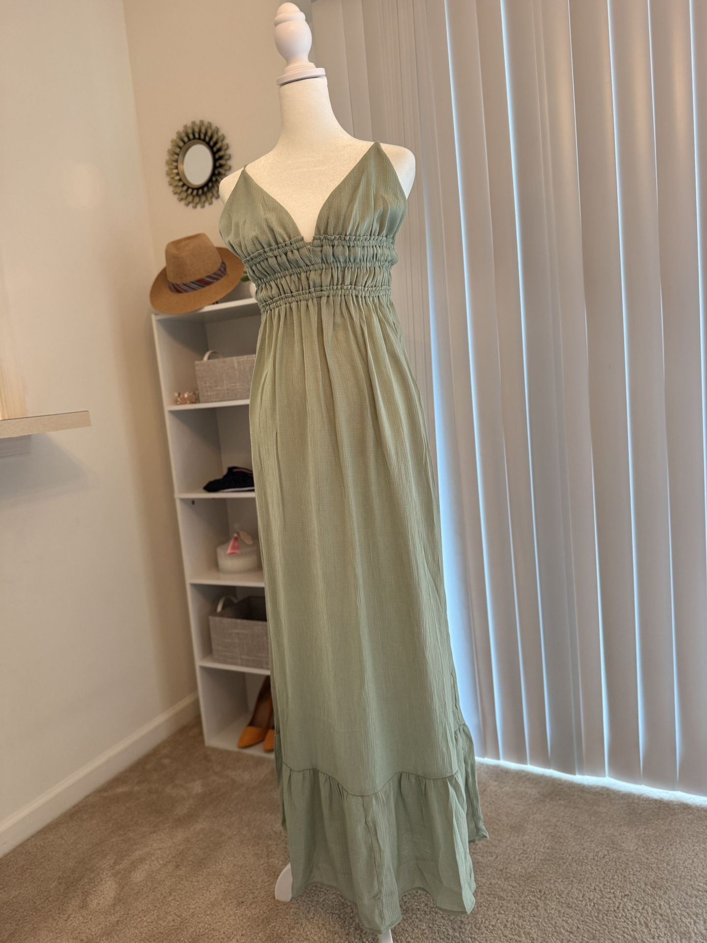 Long green dress with straps