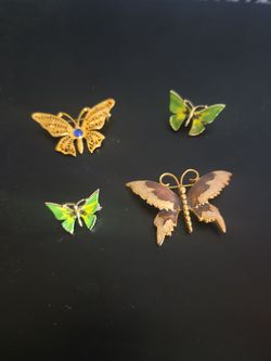 Butterfly broaches