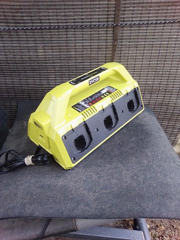 SUPER CHARGER 6 BATTERYES AND PHONE BATTERY CHARGER....$60