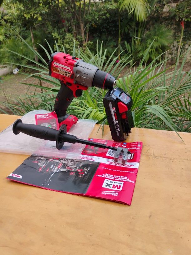 Milwaukee 18 V   New.  Fuel Hammer Drill.   2 Speed.    1/2".     W/ Battery.  3. 0. AH.  Lithium 