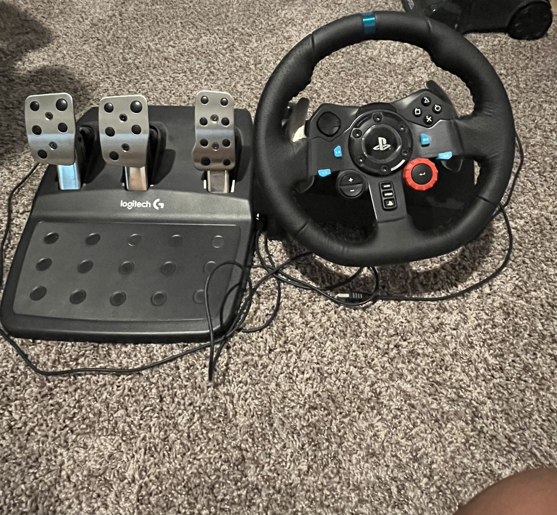 Logitech G29 steering wheel and pedal