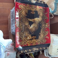 a Baroque-style leopard print serving tray.