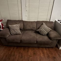 Brown Couch With 2 pillows