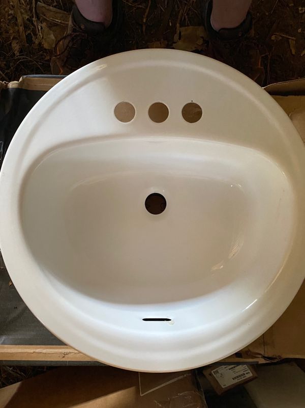 Briggs white enameled steeldrop in round bathroom sink with overflow