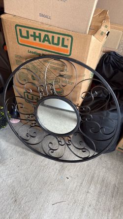 Round indoor/outdoor mirror