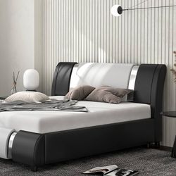Bed With Black And White Backrest