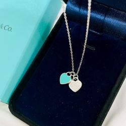 Tiffany & Co. Necklace Silver https://offerup.com/redirect/?o=YW5kLmJsdWU= hearts pendant