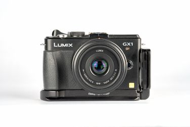 Panasonic GX1 + Panasonic 20mm f/1.7 pancake lens.
