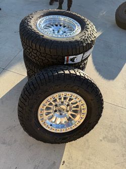 KMC 17x8.5 6x139.7 and 33 inch tires Falken
