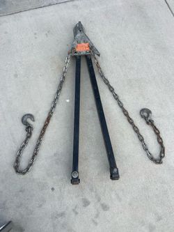 universal adjustable tow bar designed for flat towing vehicles behind a truck or