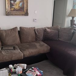 Brown 2 piece microfibre sectional/ couch with look alike leather base