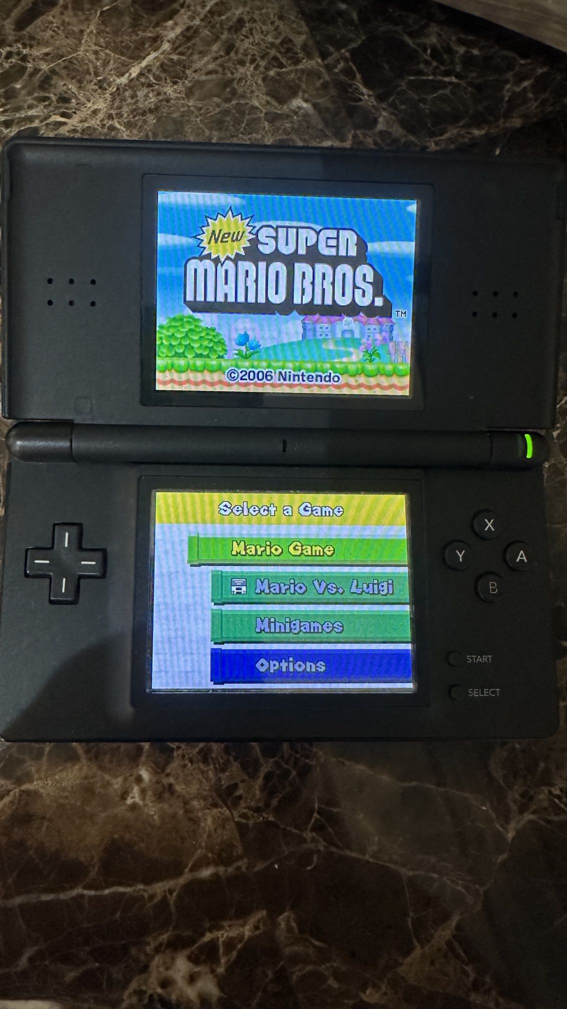 Nintendo DS Lite Charger and Stylus - Black With New Super Mario Game Handheld Video Gaming Game Console