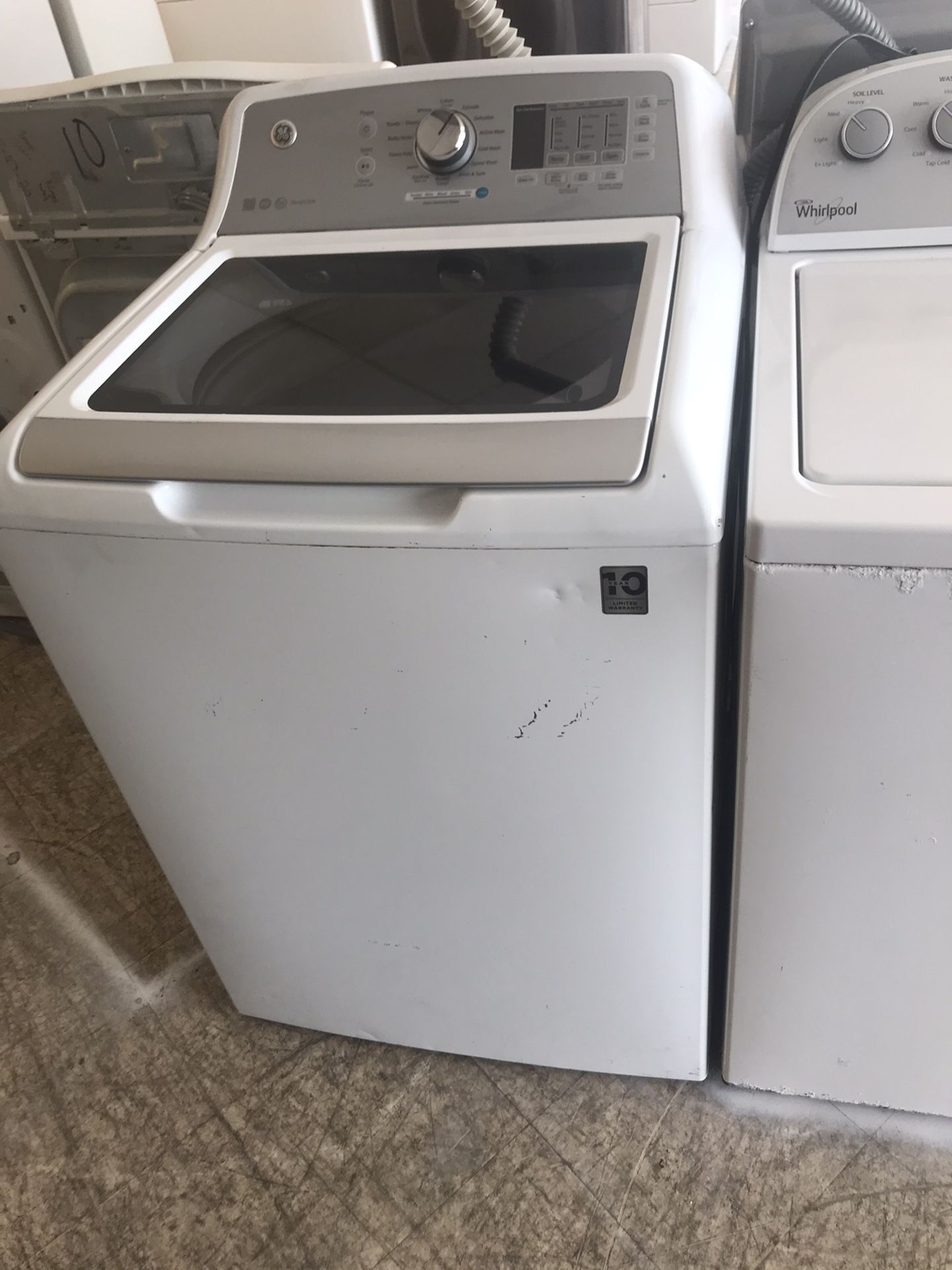 Scratch and dent model washer with warranty