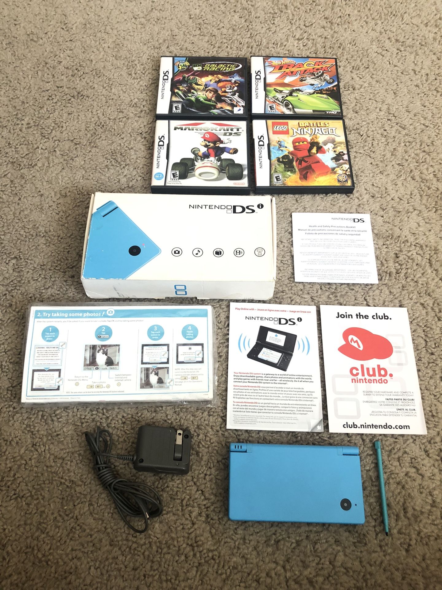 Nintendo DSi Light Blue Complete w/ Original Box manual & Inserts with 4 games