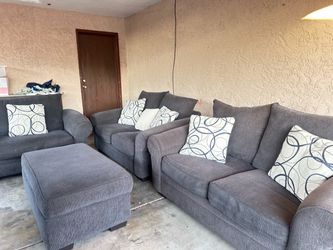 Dark gray four piece sofa set