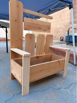 Wooden entrance planter. Custom sign
