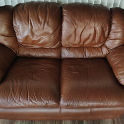 LEATHER LOVESEAT AND OVERSIZED CHAIR 