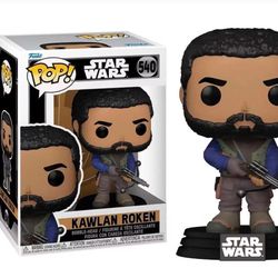 Funko Pop figure of Kawlan Roken from Star Wars. Features black hair, brown skin, and blue outfit.