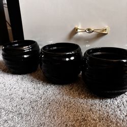 Three ceramic pots
