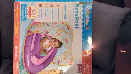 Baby boat with sun shield $15