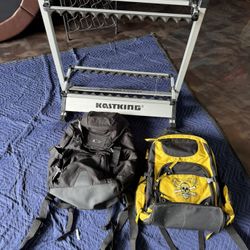 24 Fishing Rod Holder And Backpacks 1 OAKLEY and 1 Calcutta 