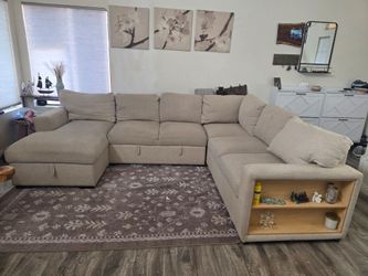 Sectional Couch with pop up sleeper