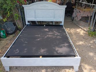 Beautiful refurbished queen bed frame.