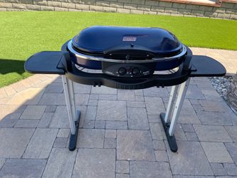 Coleman Roadtrip Propane Stove/Grill with roller bag for storage and transport