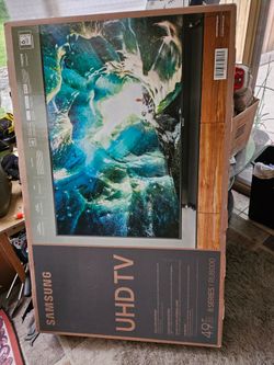 Samsung 49" UHD TV RU800 With wall mount 46"-90"  holds up to 150 pounds